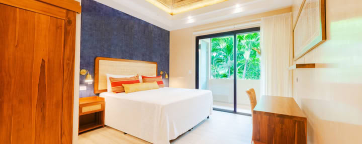 Suite con jardín con aire acondicionado – solo cama king